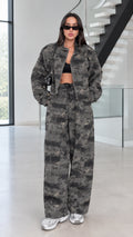 Front view of model wearing Green Camo cropped jacket and wide-leg pants two-piece set