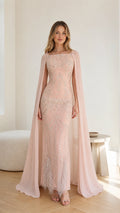 Full front view of the Blush Pink sequin cape evening gown with feather hem