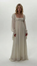 Front view of model wearing ivory Regency empire waist chiffon maxi dress