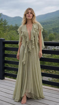 Ethereal Ruffled V-Neck Maxi Dress in Sage Green front view on outdoor deck