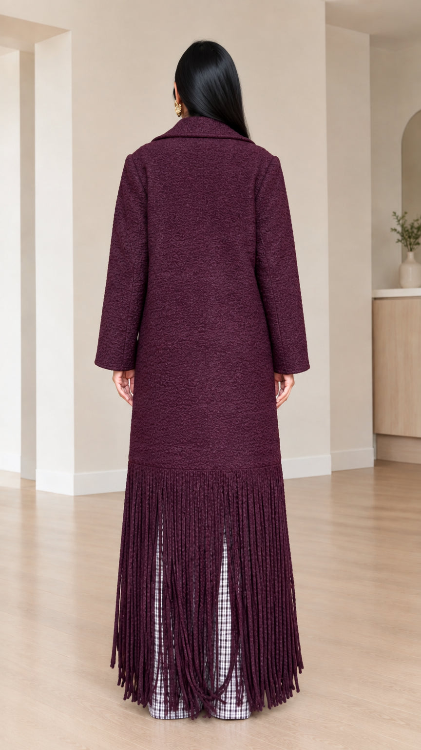 Back view of Deep Burgundy bouclé longline coat showing full-length fringe trim